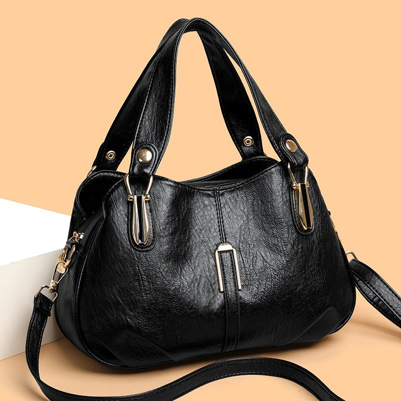 Solid-color multi-pocket handbag